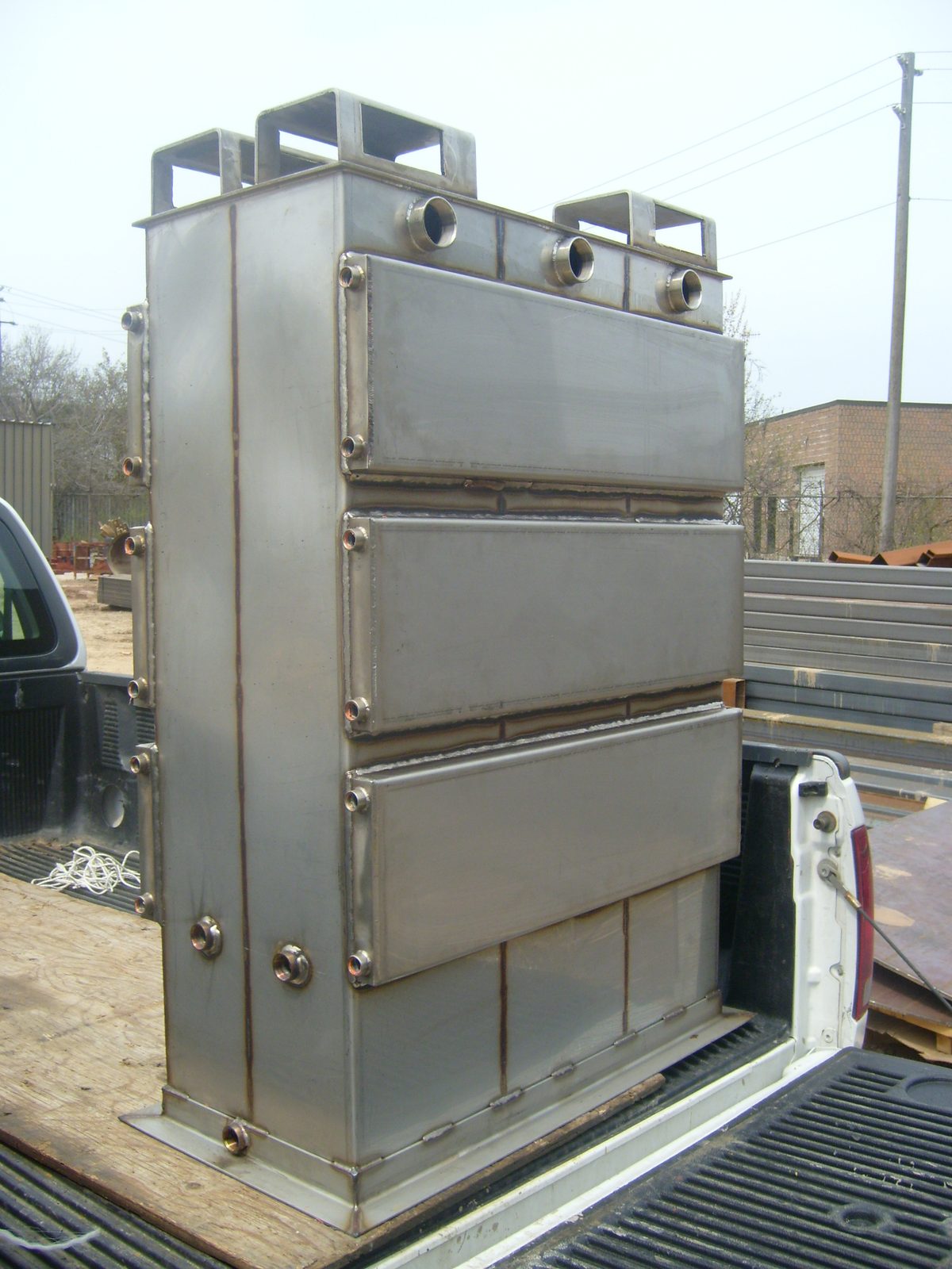 Stainless steel jacketed tank, custom fabricated by Dan's Welding & Fabricating in Burlington