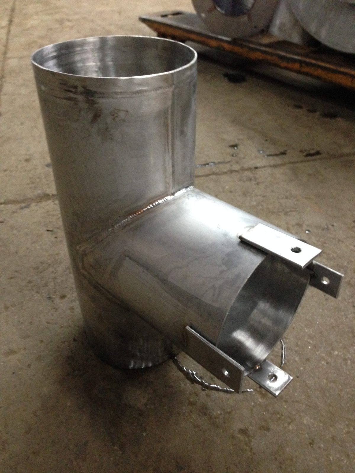 Stainless steel tee, custom fabricated by Dan's Welding & Fabricating in Burlington